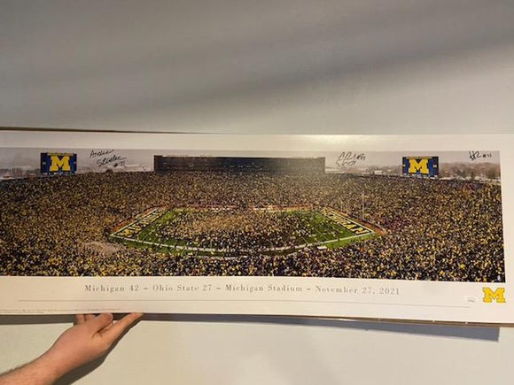 Hassan Haskins signed michigan vs osu panoramic photo also signed by erick all and andrew stueber. Jsa coa